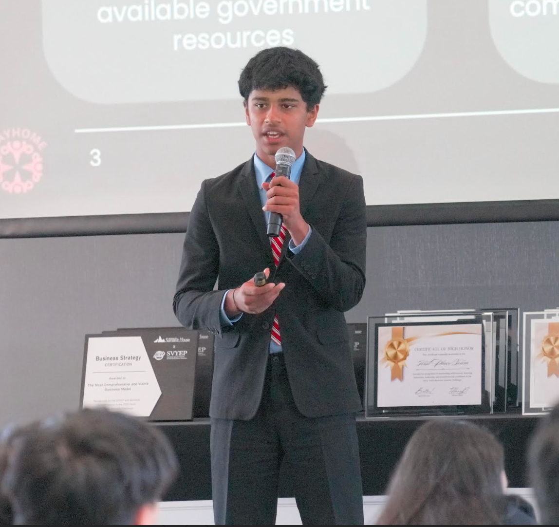 An IRISTEM student presenting research to an audience