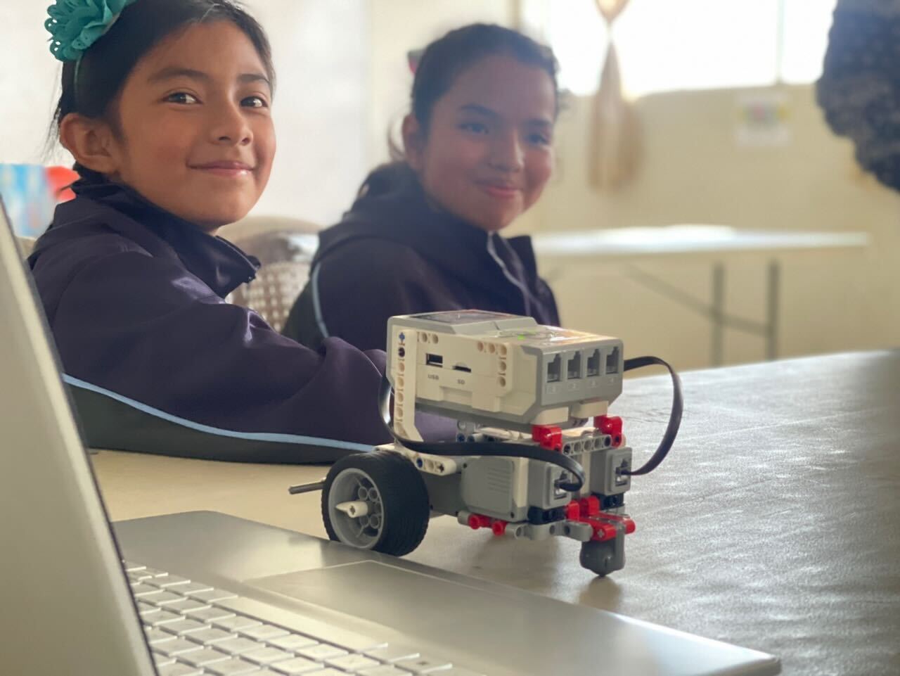 Students exploring robotics during an IRISTEM learning session