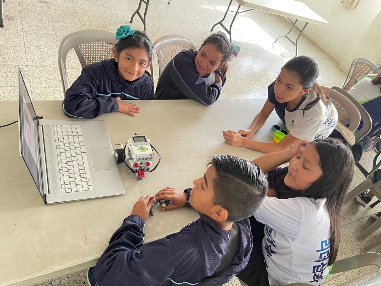 Young students accessing STEM education materials